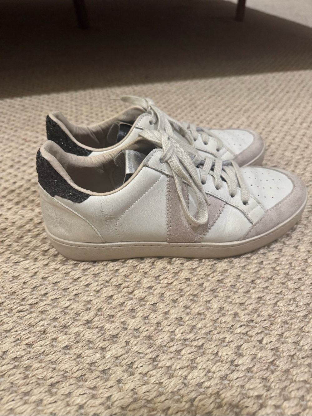 Victoria size 7 sneakers with silver and black glitter heel.
